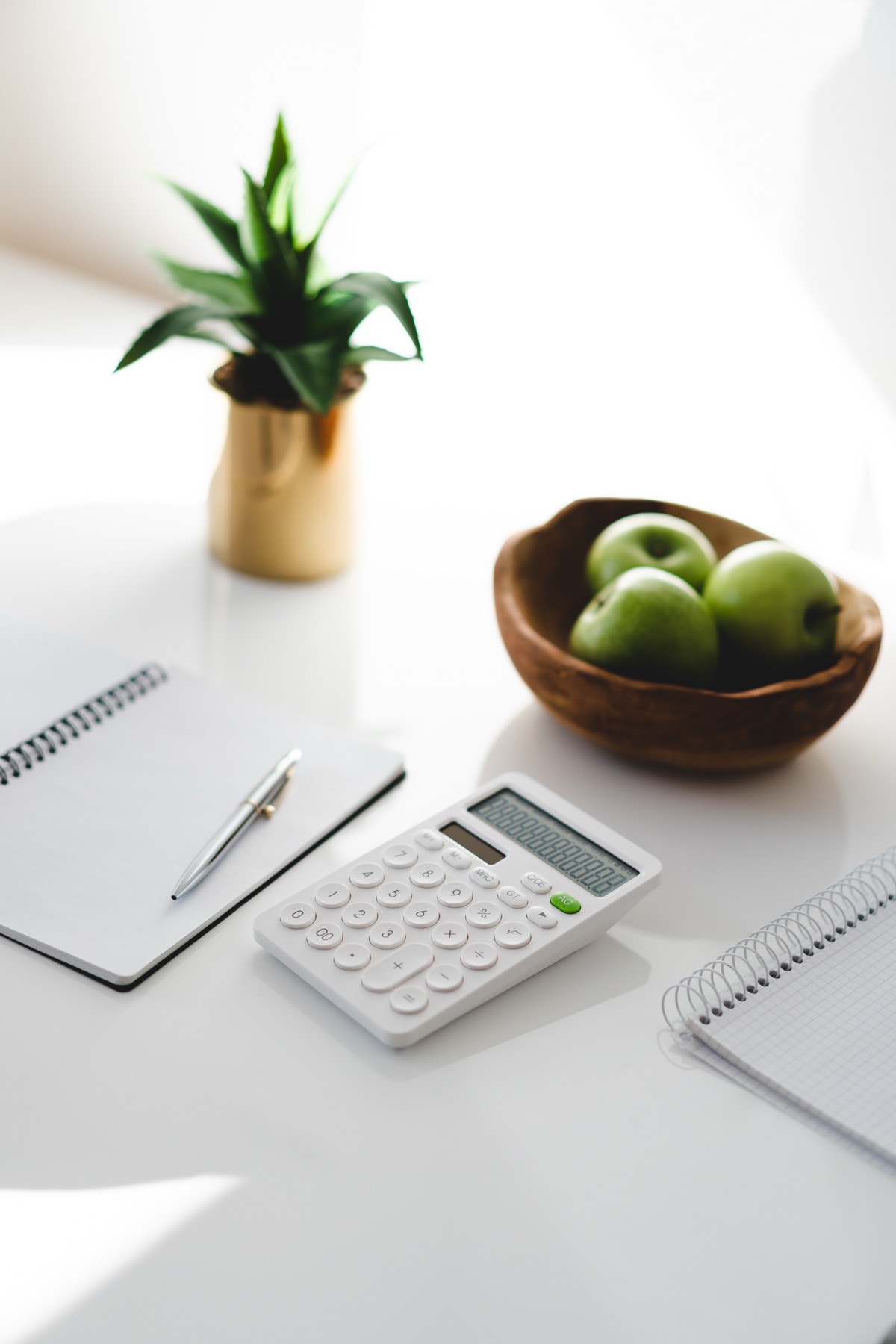 Financial planning desk with calculator and paperwork