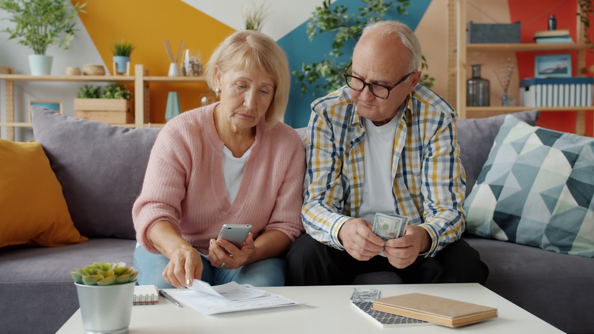 A couple reviewing their finances at home
